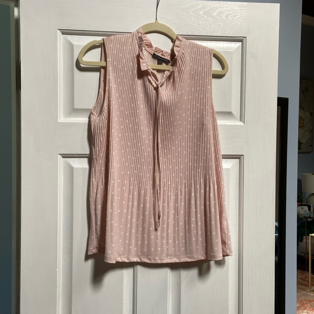 Pink and white polka dot blouse
